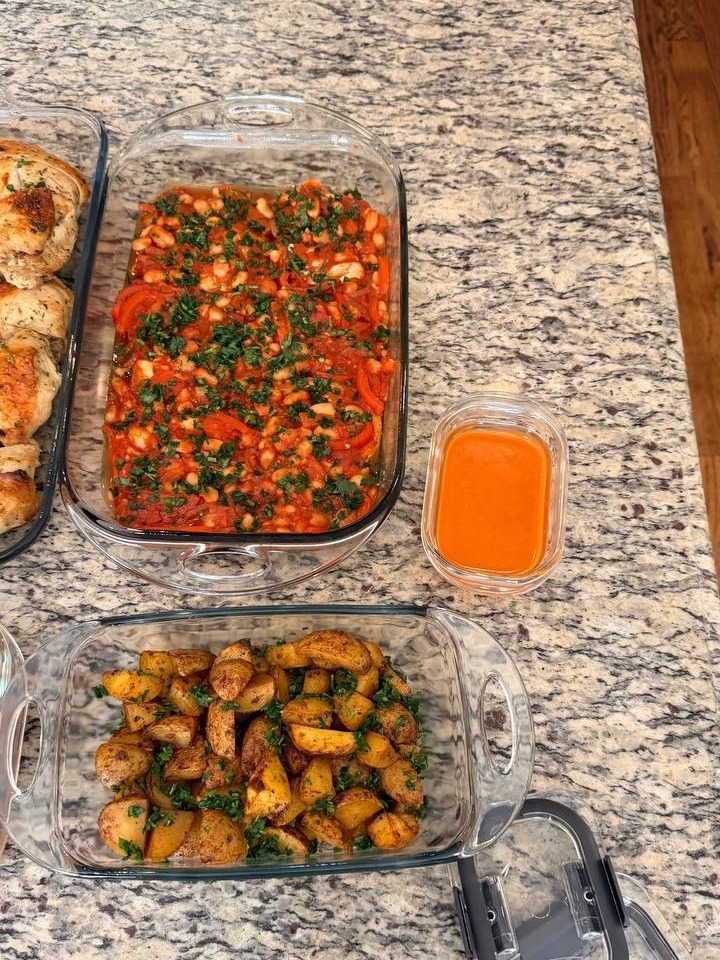 table with a variety of dishes, including a casserole