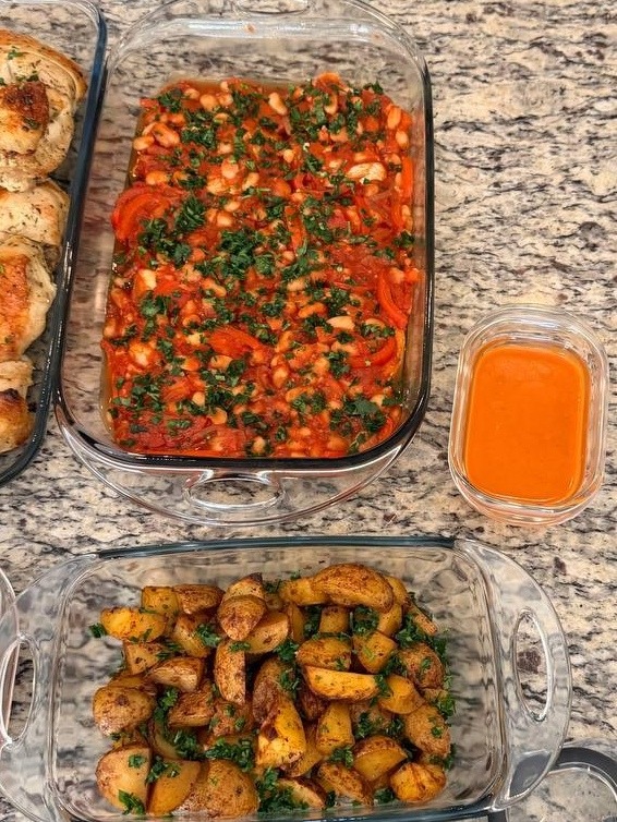 table with a variety of dishes, including a casserole