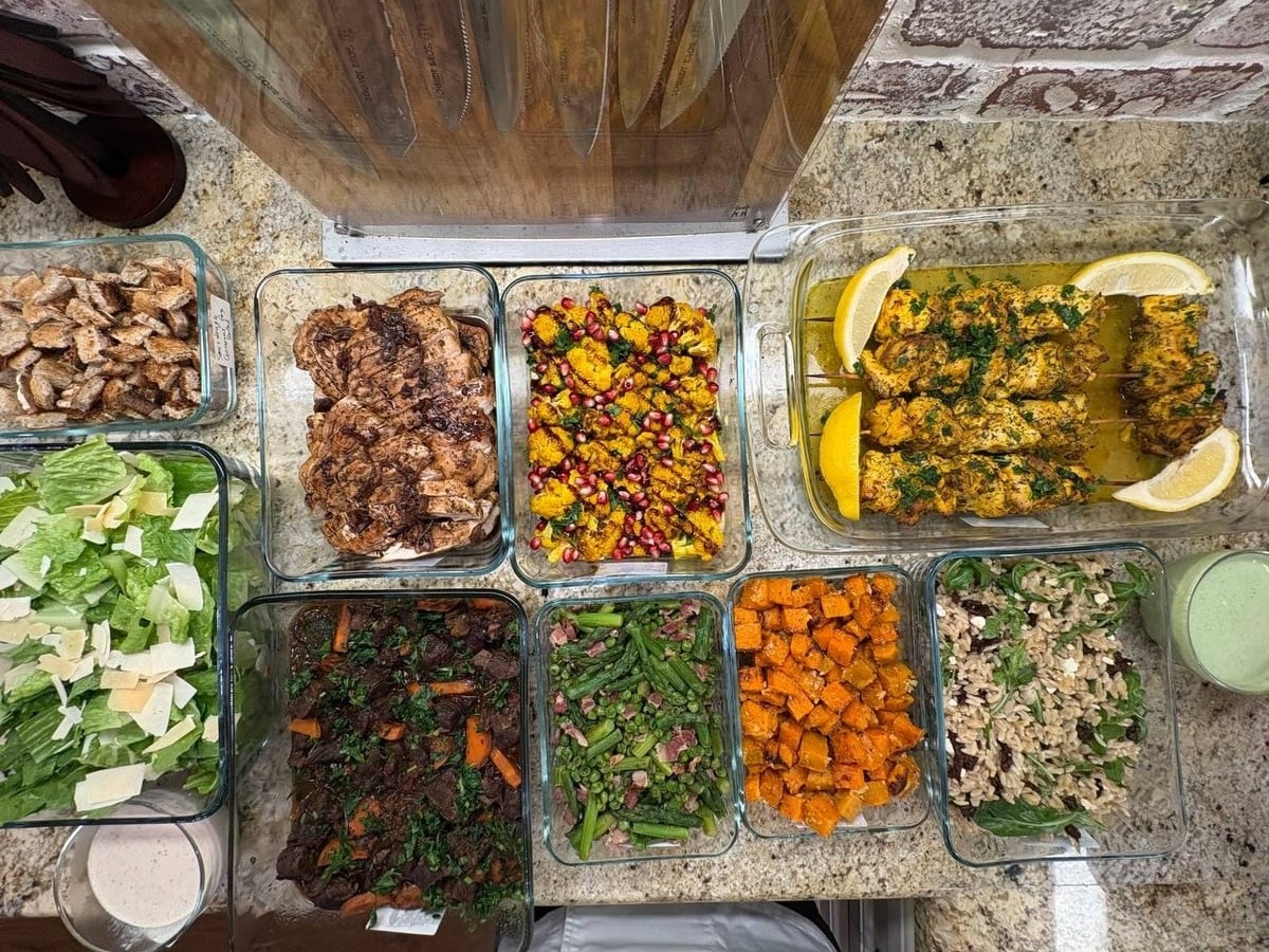 variety of food items are displayed on a counter