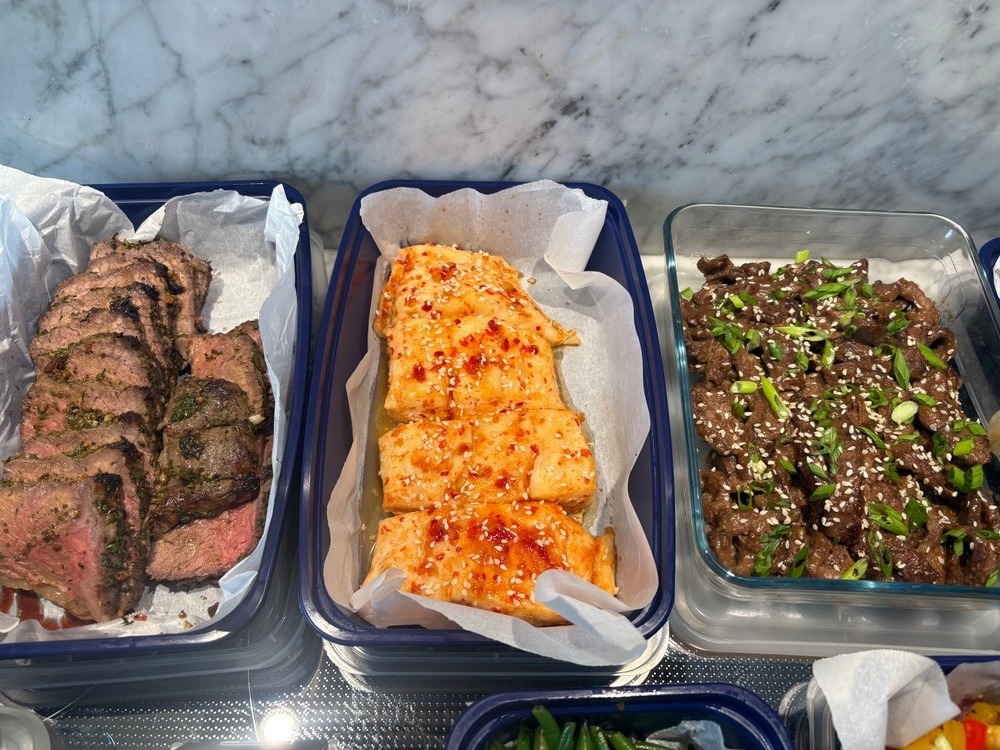 Overview of beef, spicy fish, and Korean-style beef meal prep.