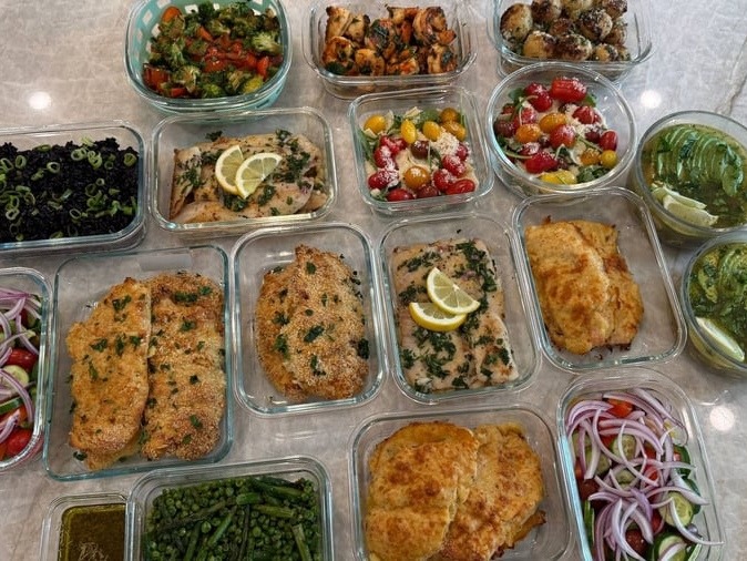 Seventeen containers cover the island: truffle potatoes, spanish shrimp, salsa verde soup and greek salads.