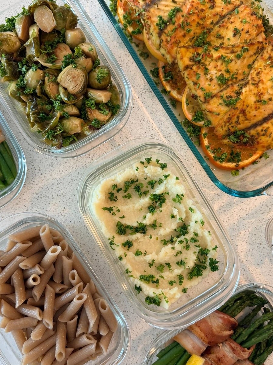 Parsnip puree flecked with parsley sits between cassava penne, maple brussels sprouts and bacon wrapped asparagus.