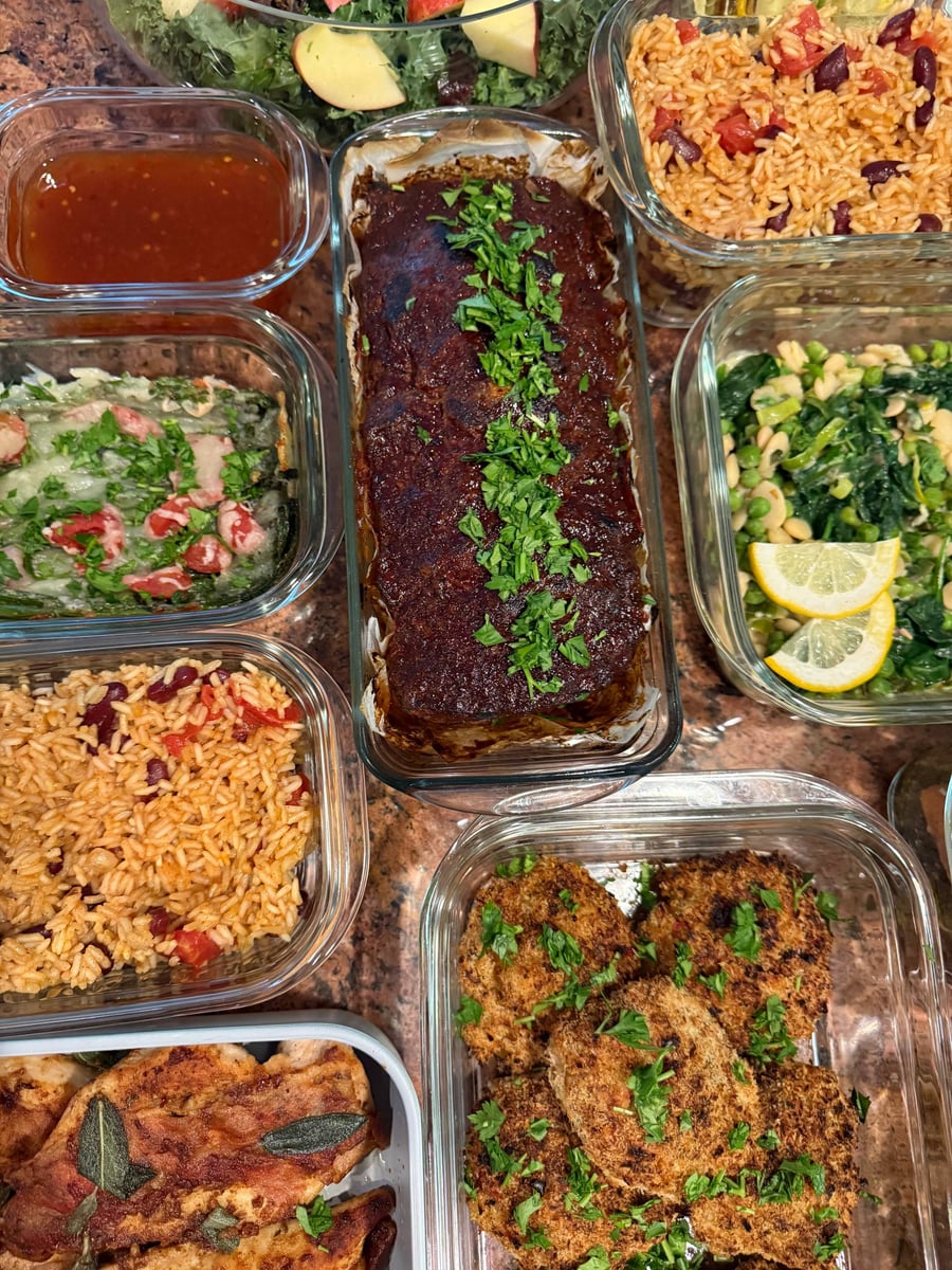 Chopped parsley runs down the lacquered BBQ balsamic meatloaf, sweet chili sauce pooled in its own tub.