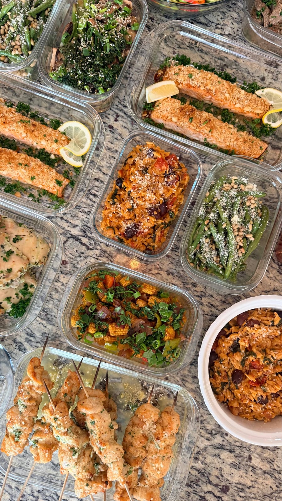 Pine nuts and parmesan cover the dijon green beans, orzo and sesame broccolini pressed alongside.
