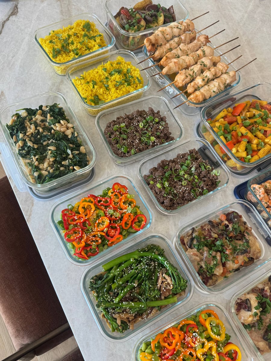 Turmeric rice and Korean ground beef divide chicken skewers, spinach beans, baby corn, edamame salad and coq au vin.