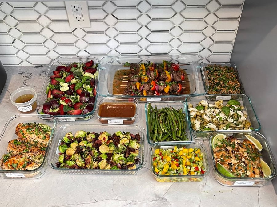 Hexagon tile frames the whole delivery, farro and gnocchi at the back, salsa and shrimp in front.
