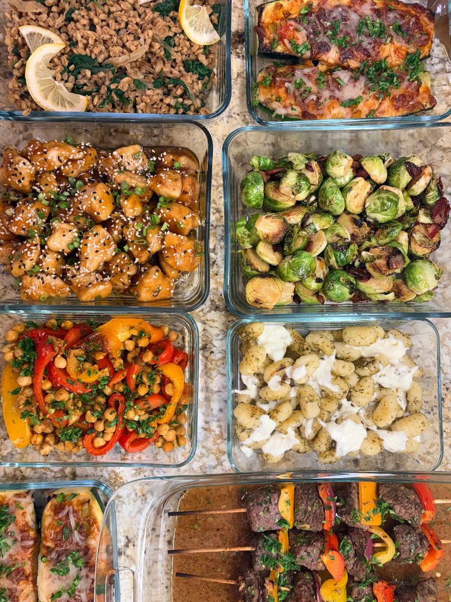 Maple bacon Brussels sprouts sit beside pesto burrata gnocchi, sesame chicken, cumin peppers and sirloin kebabs.