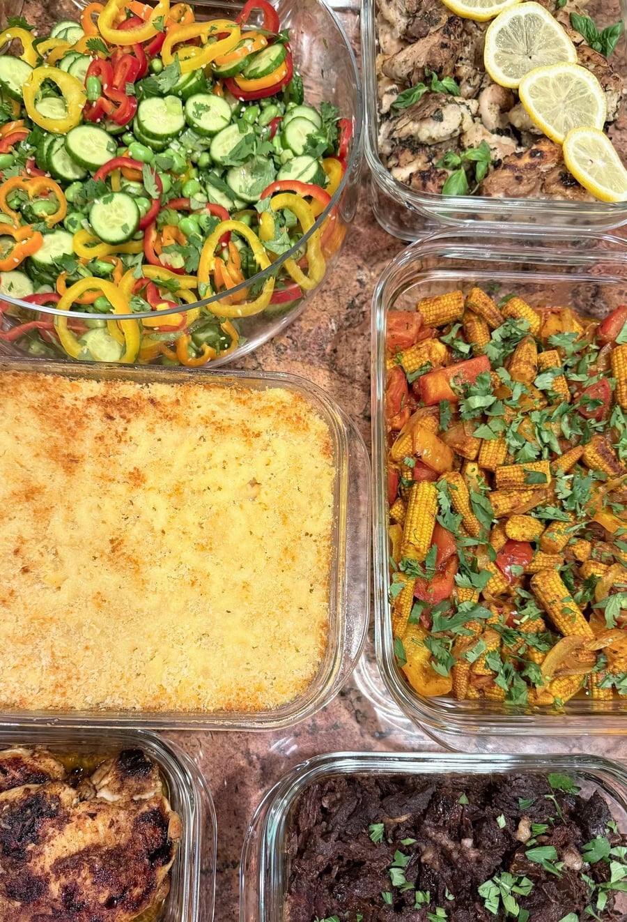 Lemon basil chicken and baked mac and cheese anchor miso cod, turmeric rice, chuck roast, salad and vegetables.