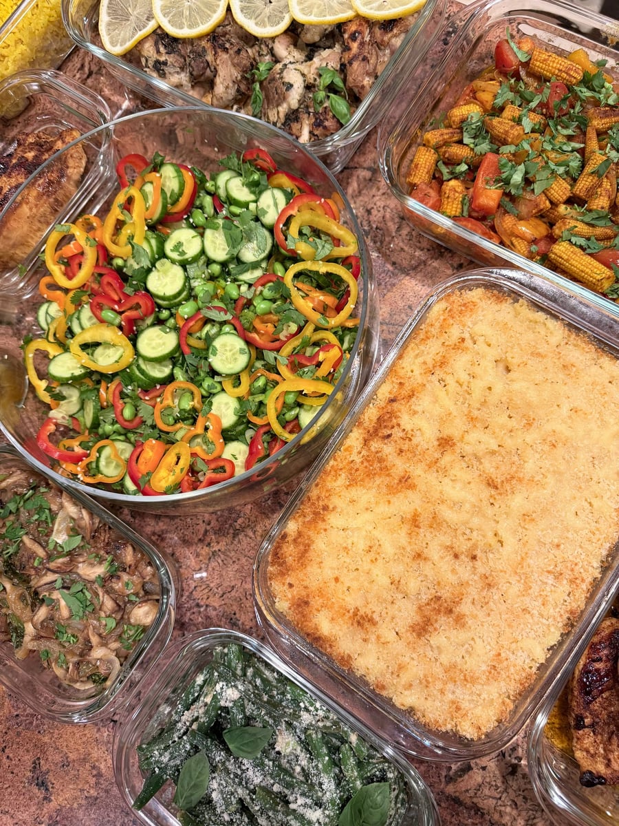 Golden macaroni crust separates lemon chicken and shredded chuck roast from cilantro-covered baby corn and peppers.