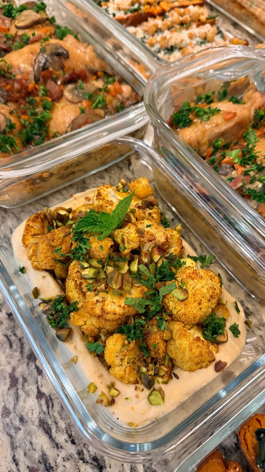 Bacon and browned mushrooms crowd the chicken thighs in the coq au vin, parsley thrown over.