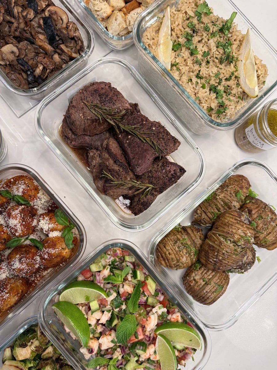 Rosemary-topped sirloin steaks sit between lemon brown rice, lime-bright shrimp ceviche and garlic Hasselback potatoes.