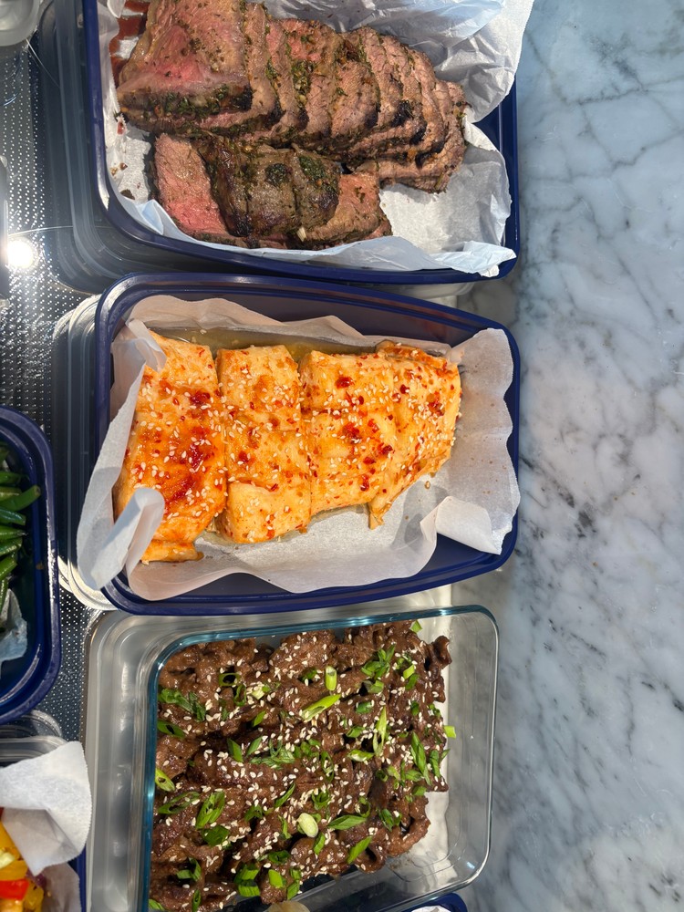 Overview of beef, spicy fish, and Korean-style beef meal prep.