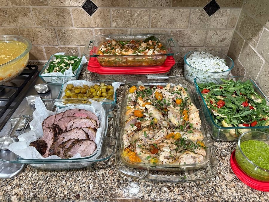 Overview of meal prep dishes including proteins, sides, and salads.