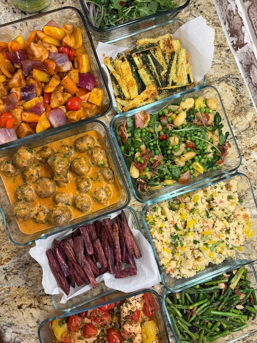 Gnocchi with peas and arugula anchors a spread of couscous, asparagus, meatballs and zucchini sticks.