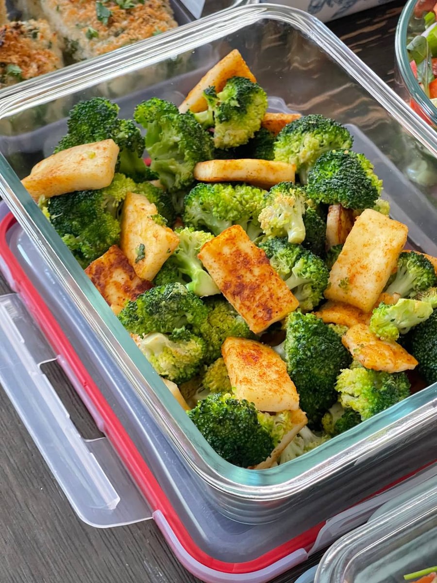 Broccoli florets and paprika-dusted paneer batons tossed together, the paneer edges gone deep gold in the pan.
