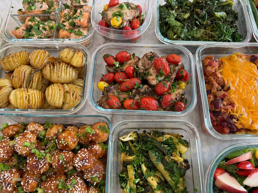 Tomatoes burst over dark zaatar-rubbed chicken thighs, hasselback potatoes and turkey chili flanking the dish.
