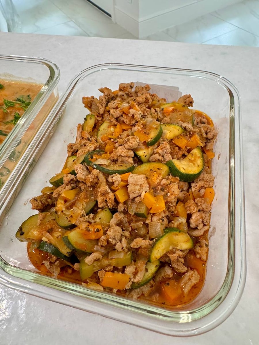 Orange sweet potato cubes and zucchini rounds run through the mediterranean ground turkey.