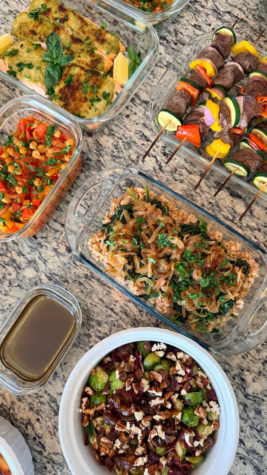 Farro and northern beans hide under a tangle of caramelized onion, spinach threading through the grain.