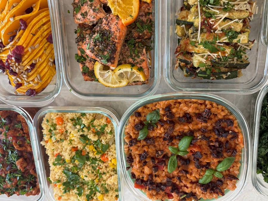 Orange wheels rest on the honey sumac salmon, parmesan zucchini sticks and sun-dried tomato farro crowding in.