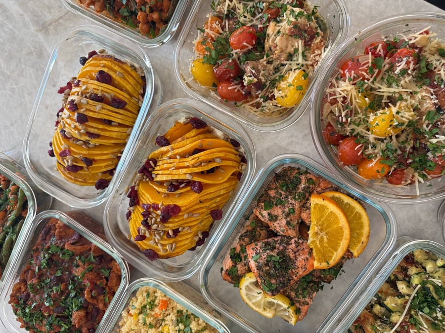 Kids portions sit plain and separate: seared chicken thighs, peas, green beans, squash cubes and salmon.