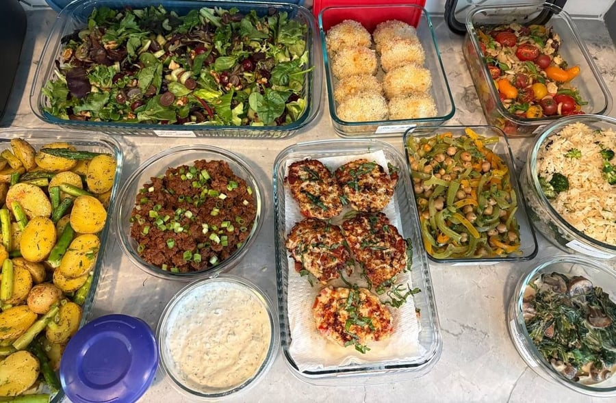 Walnuts and grapes lift the mixed greens at one corner, korean beef and chicken patties at the centre.