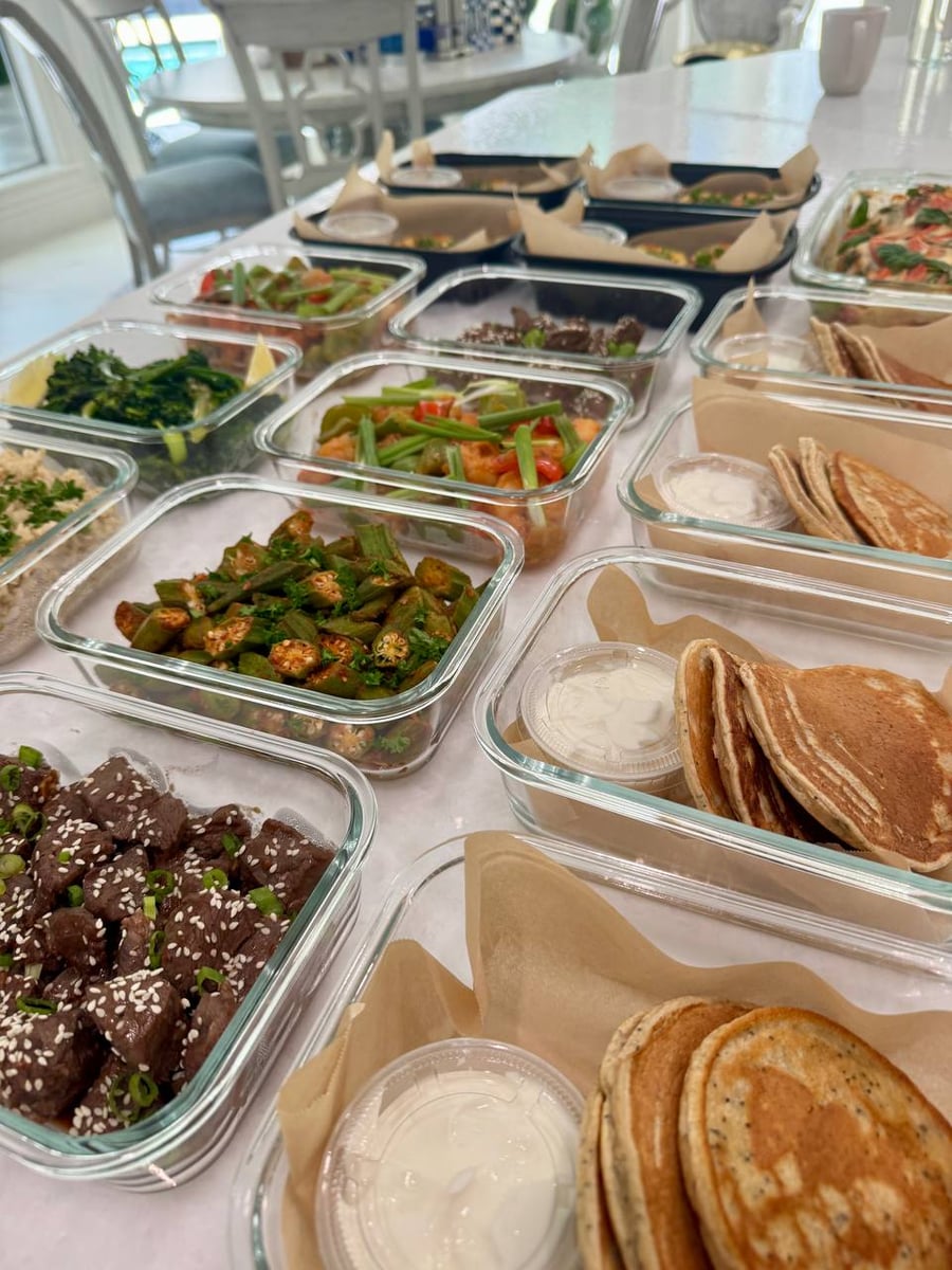 Poppyseed pancakes stacked three high beside their yogurt, okra and sirloin further down the counter.