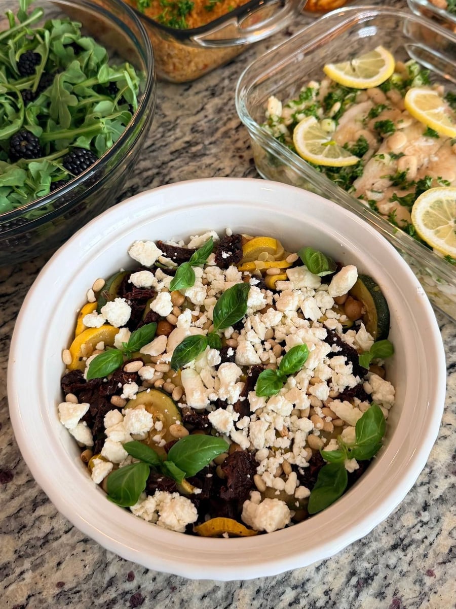 Yellow squash, chickpeas and sun-dried tomato under a heavy scatter of feta and pine nuts.