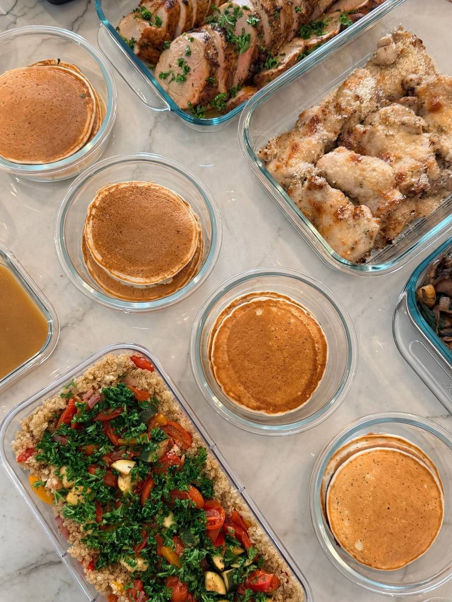Quinoa spread flat under roasted peppers, zucchini and a thick layer of chopped parsley.
