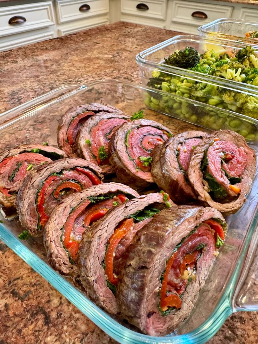 Each spiral holds roasted red pepper, spinach and gouda through rare beef, broccoli behind.