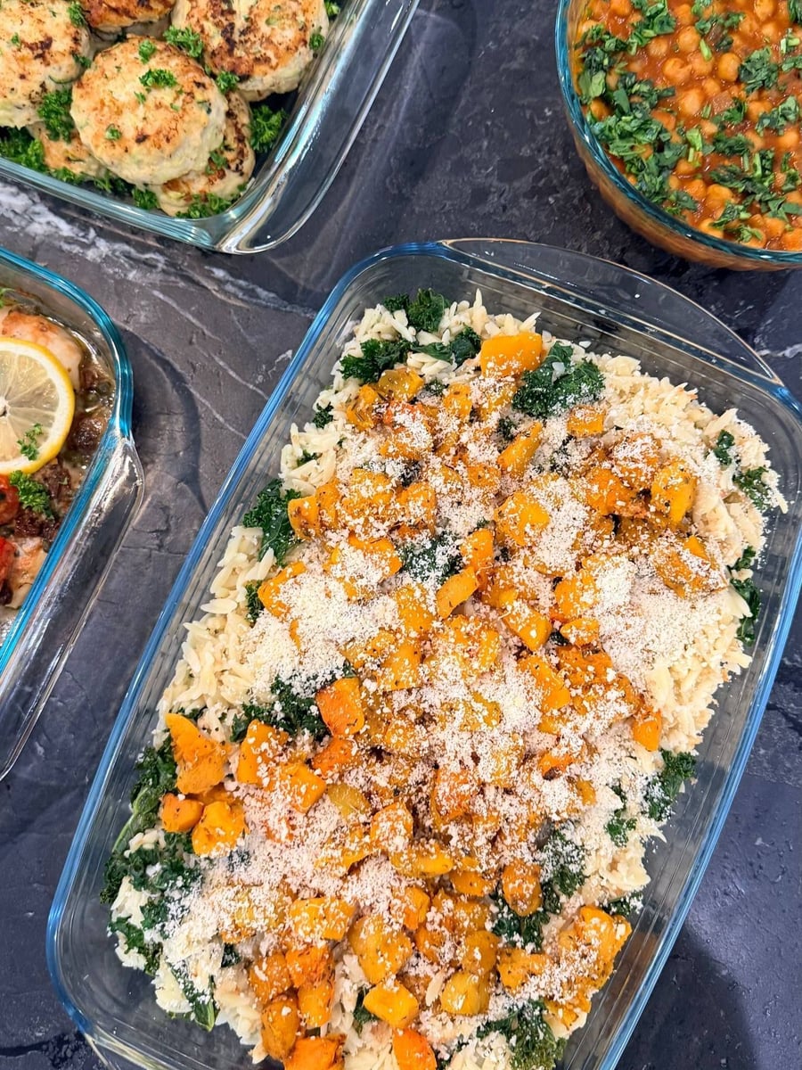 Roasted butternut cubes and torn kale run through orzo under a thick dusting of Parmesan.