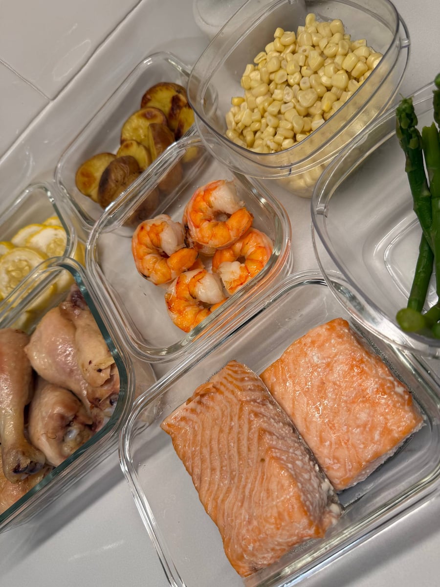 Shrimp curled beside blanched asparagus, seared corn and salmon, all cooked with just olive oil and salt.