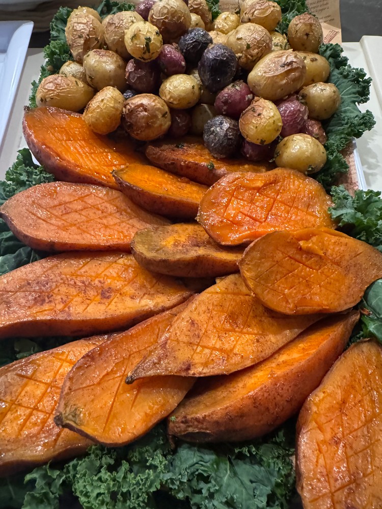 Maple cinnamon rubbed sweet potato halves and garlic crispy baked baby potatoes